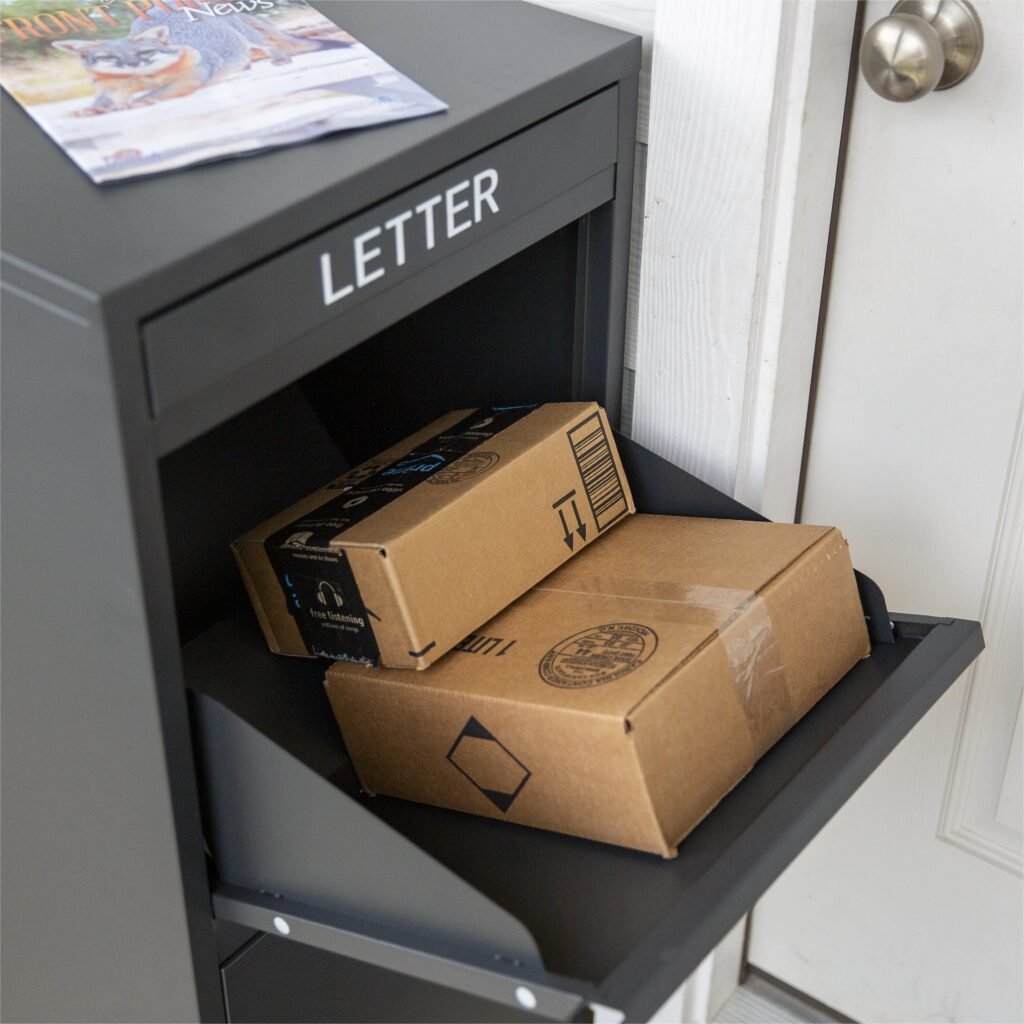 Open compartment of a Feliluke Package Delivery Box containing delivered packages.