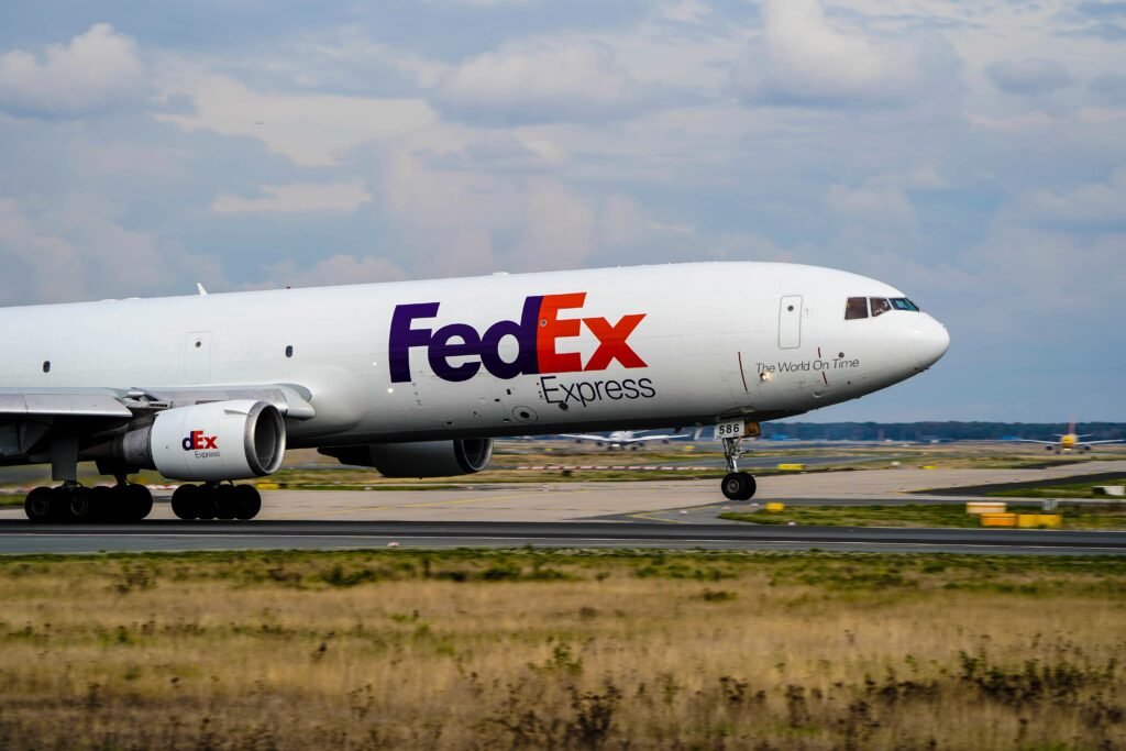 an Fedex airplane at the airport, waiting to take off